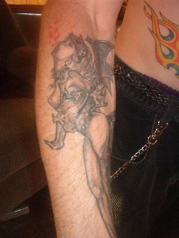 Angel & Demon At Play tattoo
