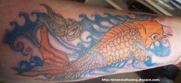 Coi fish tattoo