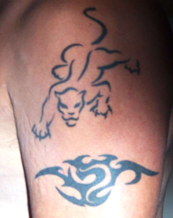 leo symbol and puma tattoo