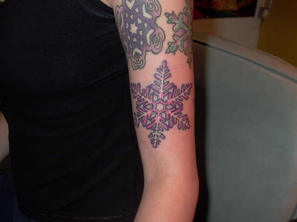 purple snowflake tattoo