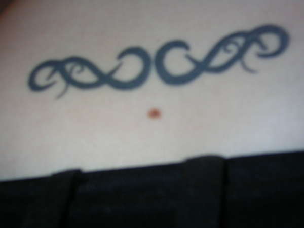 Lower back tattoo
