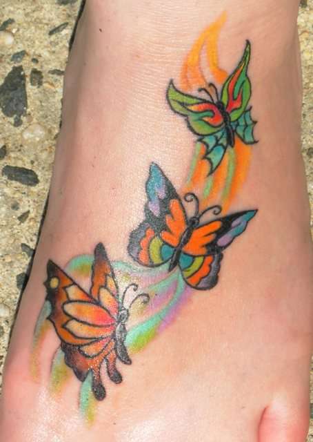 Butterflies on my foot tattoo