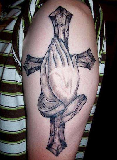 my cross and hands tattoo