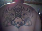 tribal dragons tattoo