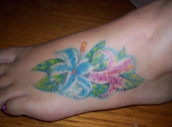 flowers on foot tattoo