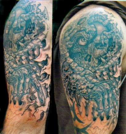 Bio mechanical skull tattoo