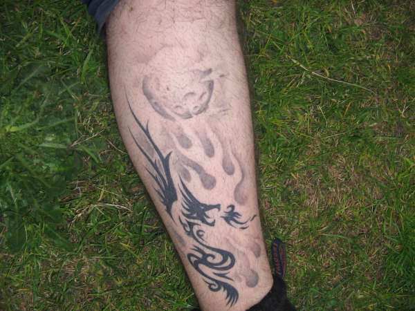 tribal dragon tattoo