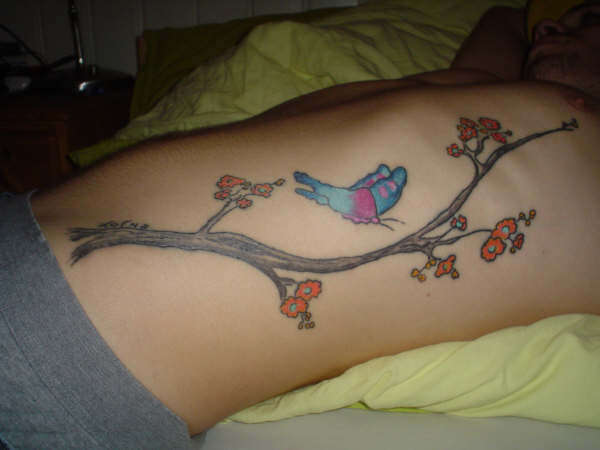 tree whit butterfly tattoo