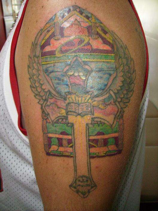 cross by scooby tattoo