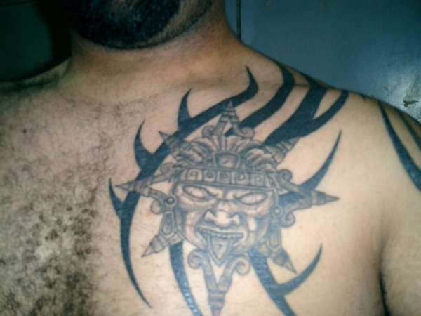 tribal chest piece tattoo
