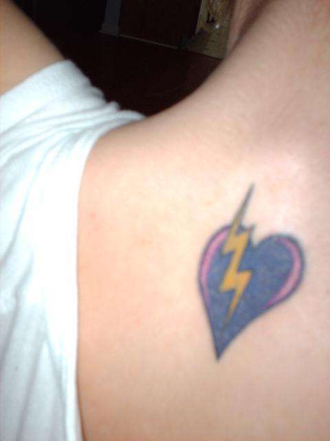 Heart and lightning bolt tattoo
