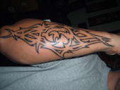 tribal "PAIN" tattoo