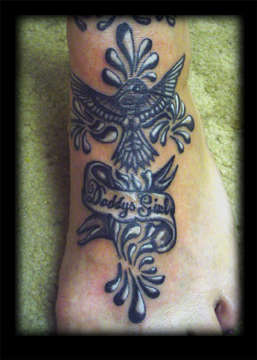 Hummingbird on foot tattoo