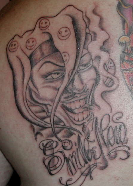 skull smile now cry later tattoo