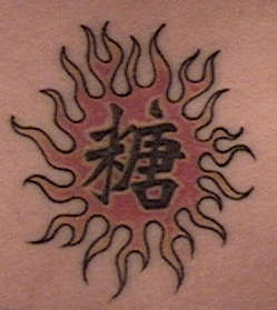 Sun & Kanji tattoo