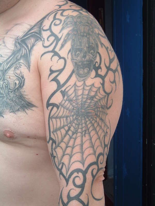 upper right arm tattoo