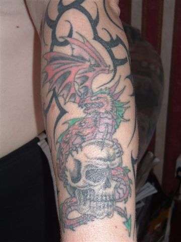 lower left arm tattoo