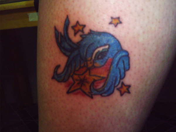 bird with stars tattoo