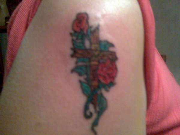 Cross and roses tattoo