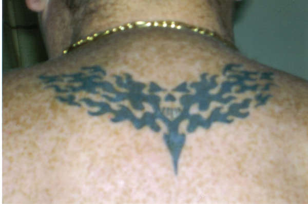 John's tribal tat tattoo