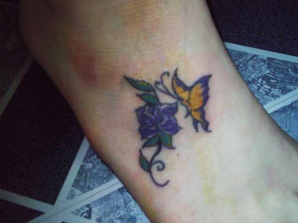 Butterfly and flower tattoo