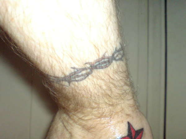 Band of thorns tattoo