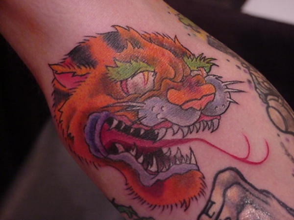 tiger with forked tongue tattoo