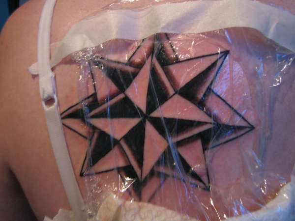 own designed star tattoo