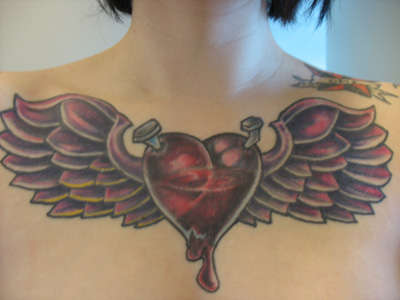 Unfinished chest tattoo