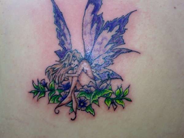 fairy on leaves tattoo