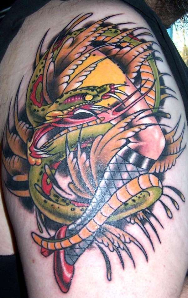 snake and leg tatt tattoo