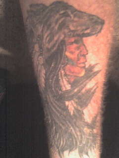 Indian and wolf tattoo