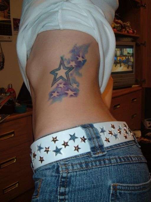 Healed Ribcage Stars tattoo
