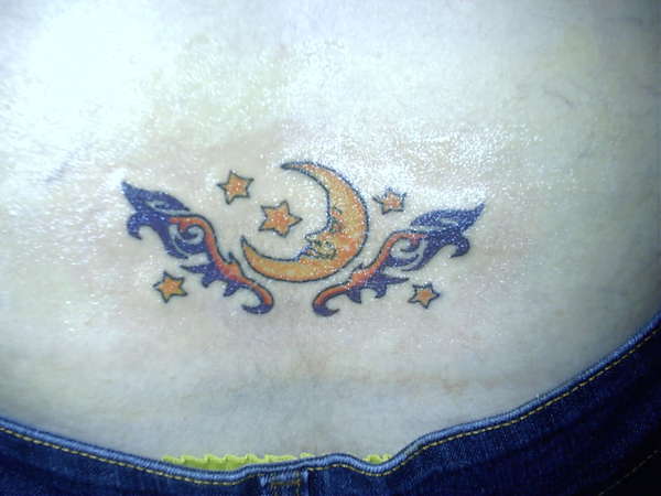 Cutesy Lil' Backpiece tattoo