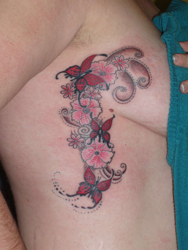 butterfly side piece tattoo