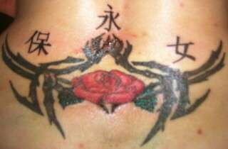 lower back tattoo. tattoo