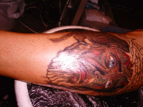jesus peice/ not done yet tattoo