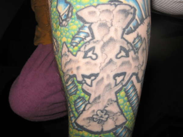 FREEHAND CROSS WITH SLEEVE STILL IN THE MAKING tattoo