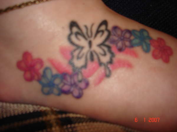 foot tat touched up:) tattoo