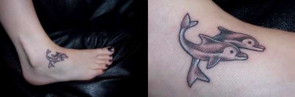 Two dolphins tattoo