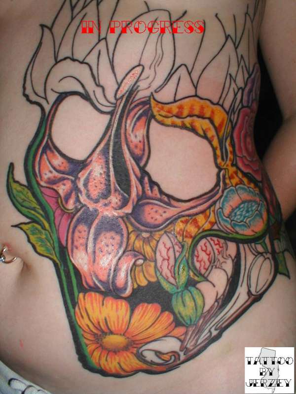 skull made out of flowers tattoo