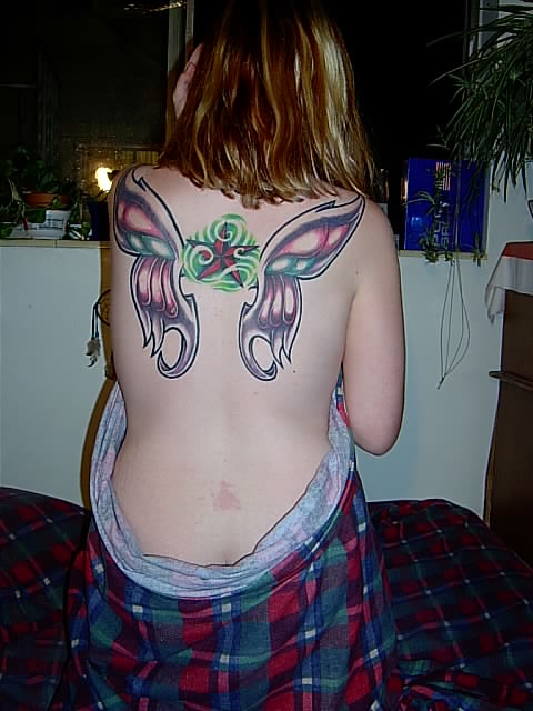 My wings 1/2 way done tattoo