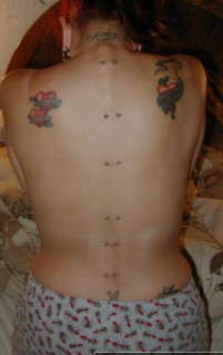 shoulders and lower back tattoo