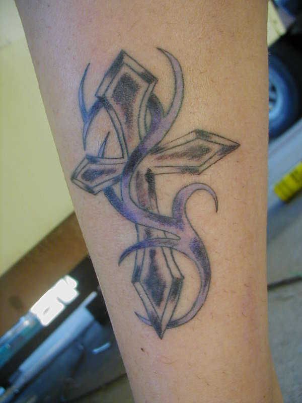 tribal cross tattoo