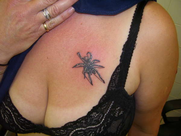 Spider tits tattoo