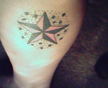 Healed Nautical Star tattoo