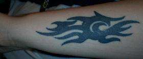 Crap tribal tattoo