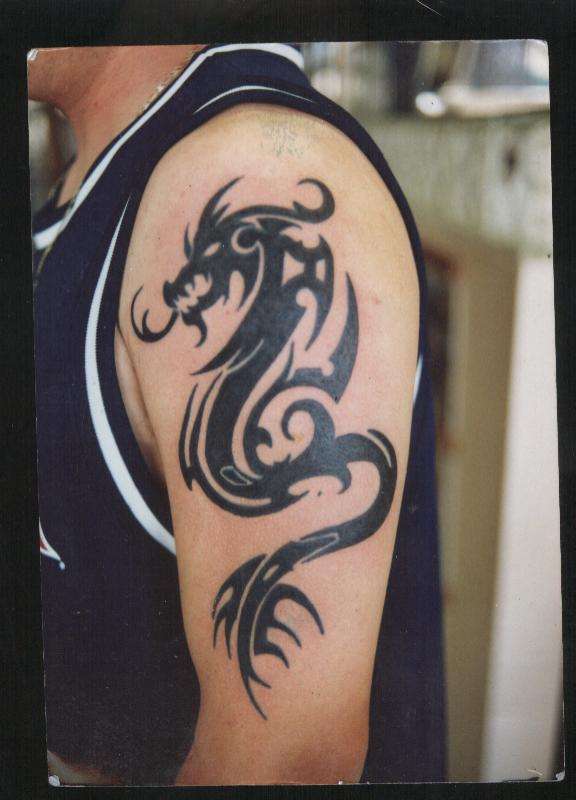 TRIBAL DRAGON done by Geo.Gill tattoo