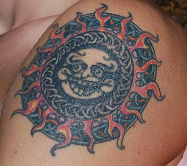 Tribal n celtic sun tattoo