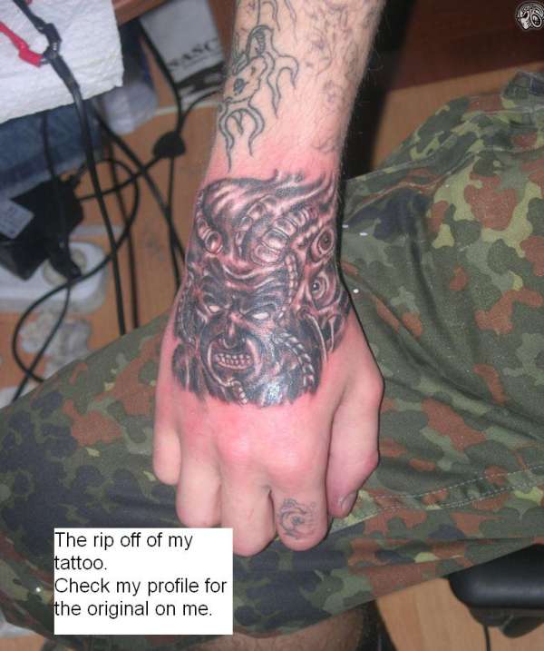 Evil Hand Rip Off tattoo